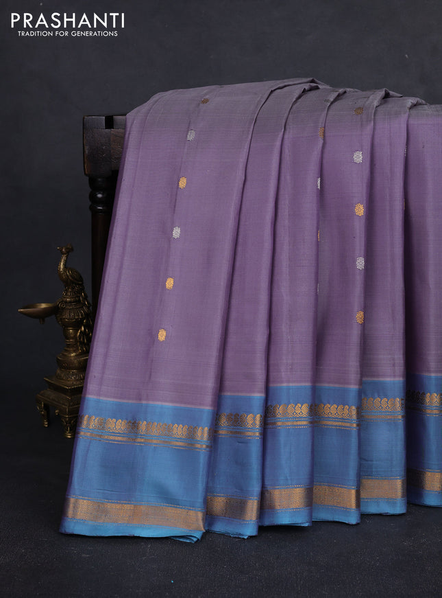 Pure gadwal silk saree pastel purple and dual tone blue with silver & gold zari woven buttas and rettapet zari woven border