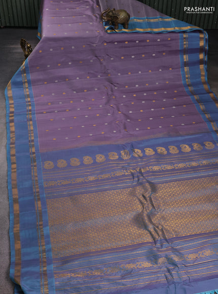 Pure gadwal silk saree pastel purple and dual tone blue with silver & gold zari woven buttas and rettapet zari woven border