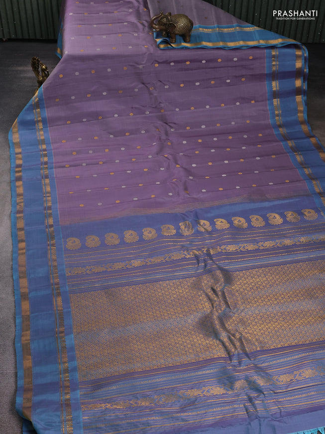 Pure gadwal silk saree pastel purple and dual tone blue with silver & gold zari woven buttas and rettapet zari woven border