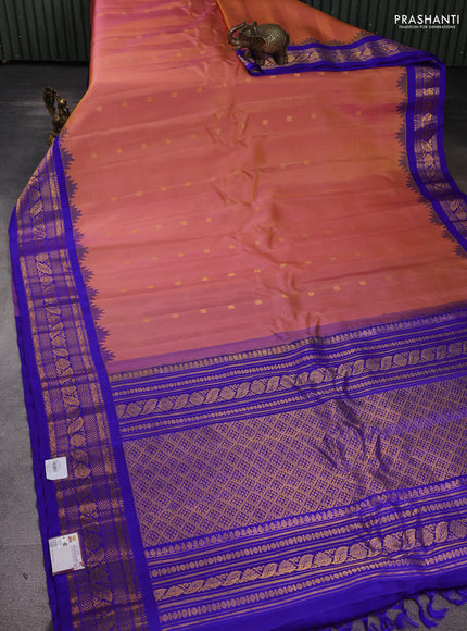 Pure gadwal silk saree dual tone peach and blue with zari woven buttas and temple design zari woven border