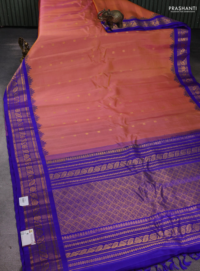 Pure gadwal silk saree dual tone peach and blue with zari woven buttas and temple design zari woven border