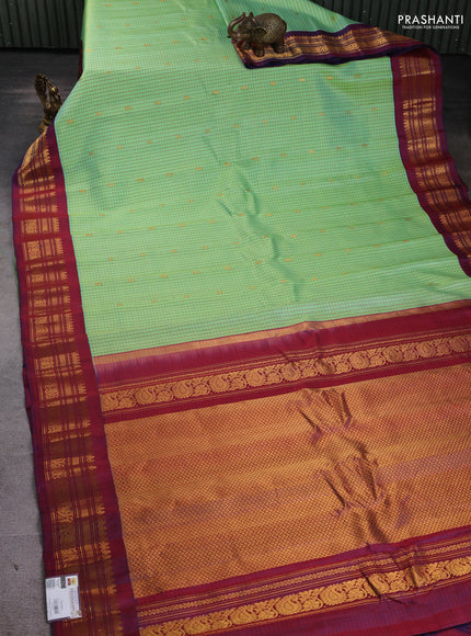 Pure gadwal silk saree pista green and maroon with allover checked pattern & zari buttas and zari woven border
