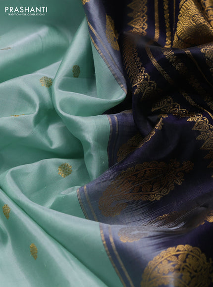 Pure gadwal silk saree pastel green and navy blue with zari woven buttas and temple design zari woven border