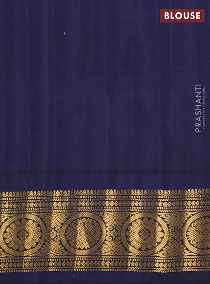Pure gadwal silk saree pastel green and navy blue with zari woven buttas and temple design zari woven border