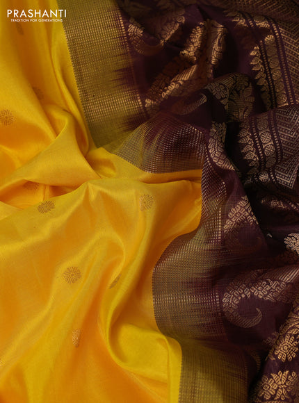 Pure gadwal silk saree yellow and deep maroon with allover zari woven buttas and temple design zari woven border