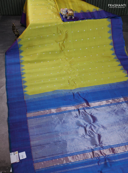 Pure gadwal silk saree lime green and dual tone bluish purple with silveer zari woven paisley buttas and temple design simple border