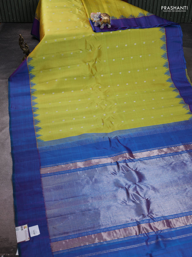 Pure gadwal silk saree lime green and dual tone bluish purple with silveer zari woven paisley buttas and temple design simple border