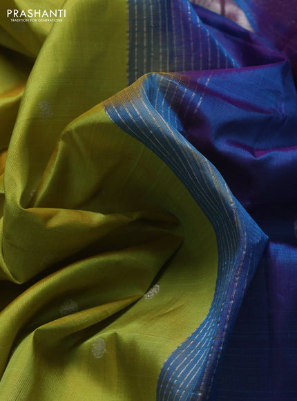 Pure gadwal silk saree lime green and dual tone bluish purple with silveer zari woven paisley buttas and temple design simple border