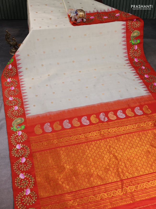 Pure Gadwal Silk Saree Off White and Orange with silver & gold zari woven buttas and temple design tanjore paint border