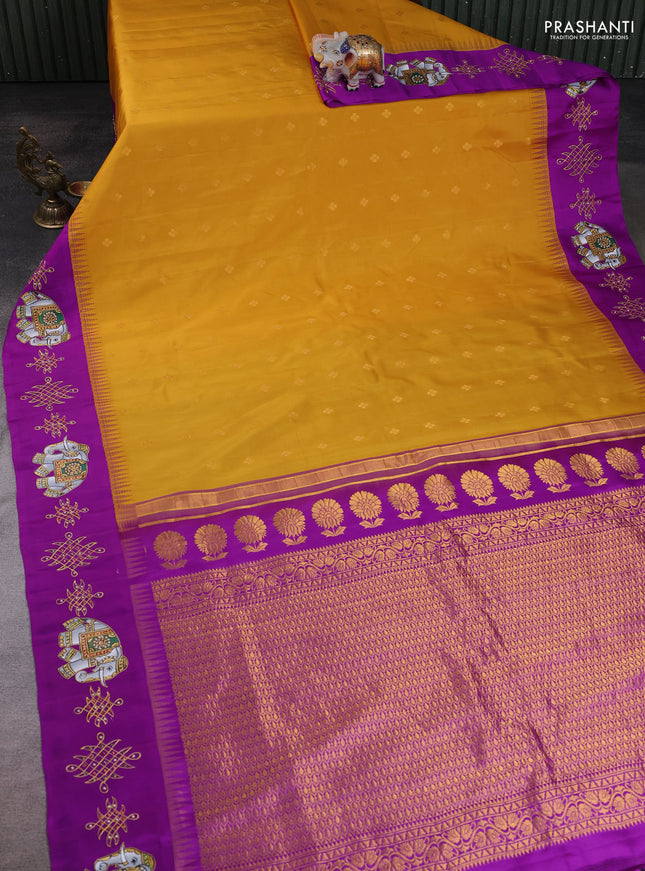 Pure Gadwal Silk Saree Yellow and Purple with zari woven buttas and temple design tanjore paint border