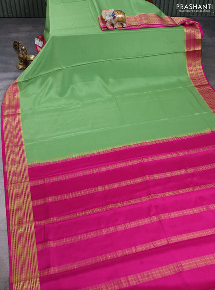 Pure Mysore Silk Saree light green and pink with plain body and zari woven border