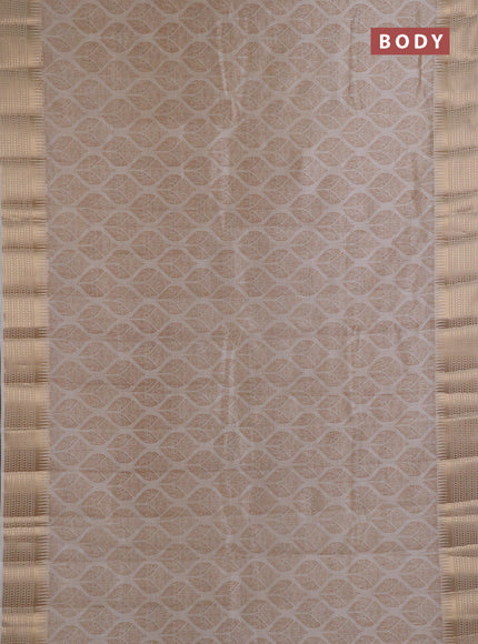 Semi Raw Silk Saree cream with allover butta prints and zari woven border