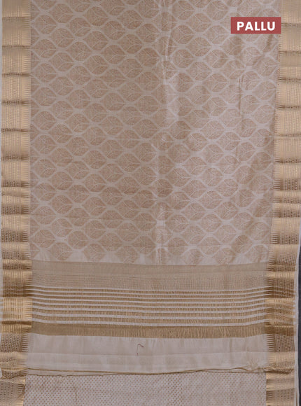 Semi Raw Silk Saree cream with allover butta prints and zari woven border