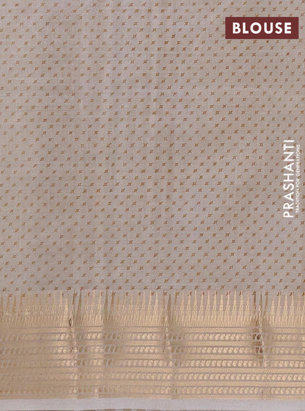 Semi Raw Silk Saree cream with allover butta prints and zari woven border