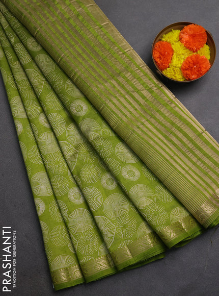 Semi Raw Silk Saree light green with allover butta prints and zari woven border