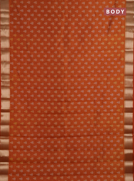 Semi Raw Silk Saree rust shade with allover butta prints and zari woven border