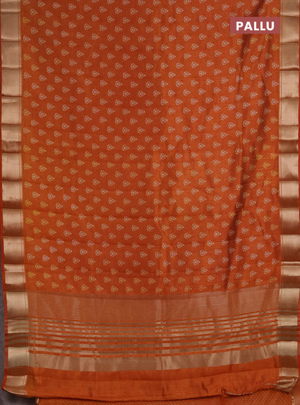 Semi Raw Silk Saree rust shade with allover butta prints and zari woven border