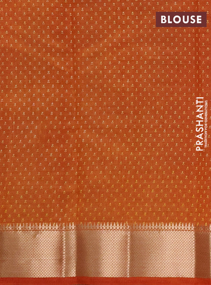 Semi Raw Silk Saree rust shade with allover butta prints and zari woven border