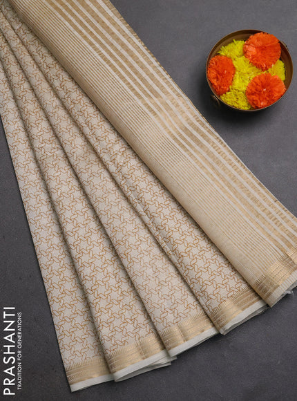 Semi Raw Silk Saree cream with allover geometric prints and zari woven border
