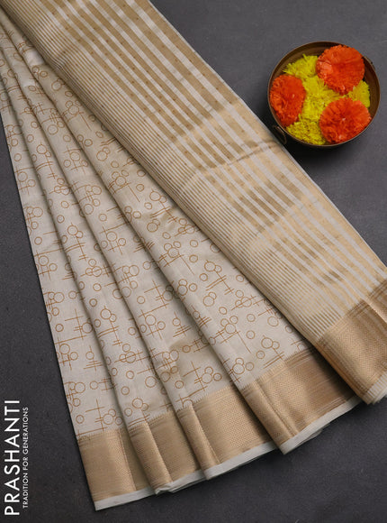 Semi Raw Silk Saree cream with allover geometric prints and zari woven border