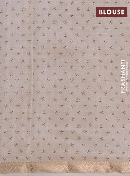 Semi Raw Silk Saree cream with allover zig zag prints and zari woven border