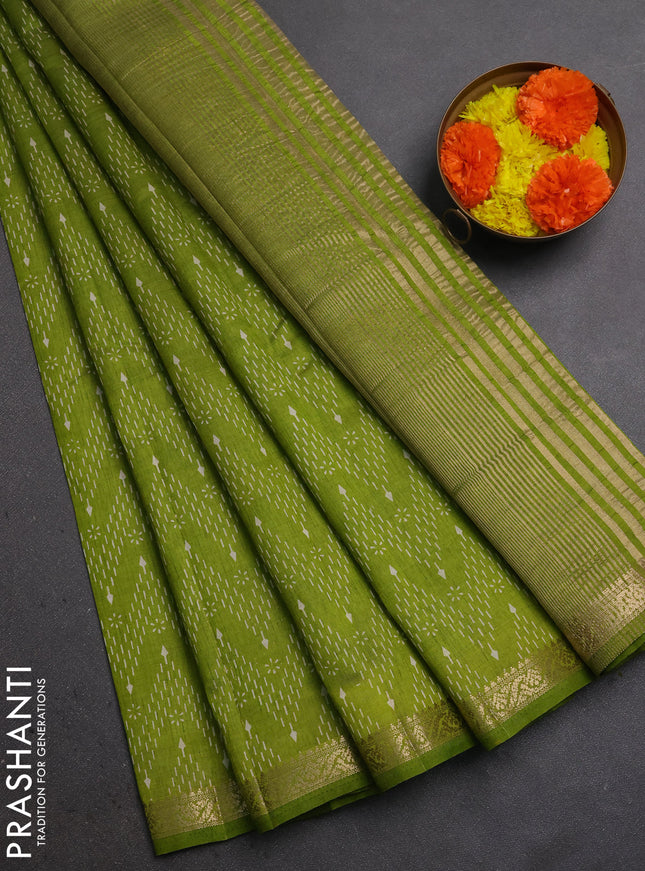 Semi Raw Silk Saree light green with allover zig zag prints and zari woven border