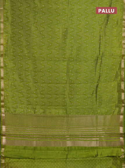 Semi Raw Silk Saree light green with allover zig zag prints and zari woven border
