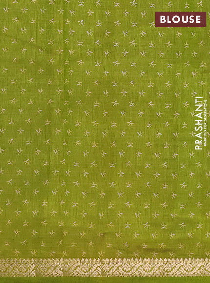 Semi Raw Silk Saree light green with allover zig zag prints and zari woven border