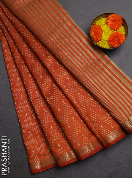 Semi Raw Silk Saree rust shade with allover zig zag prints and zari woven border