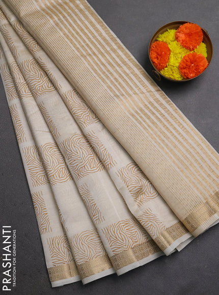 Semi Raw Silk Saree cream with allover box type butta prints and zari woven border