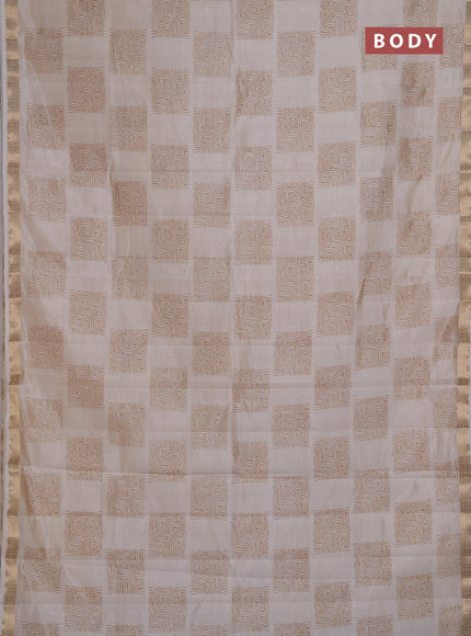 Semi Raw Silk Saree cream with allover box type butta prints and zari woven border