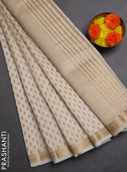 Semi Raw Silk Saree cream with allover butta prints and zari woven border