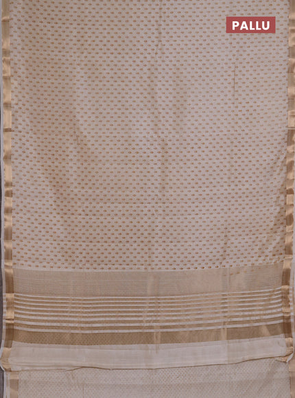 Semi Raw Silk Saree cream with allover butta prints and zari woven border