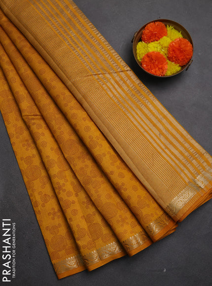 Semi Raw Silk Saree dark mustard with allover geometric butta prints and zari woven border