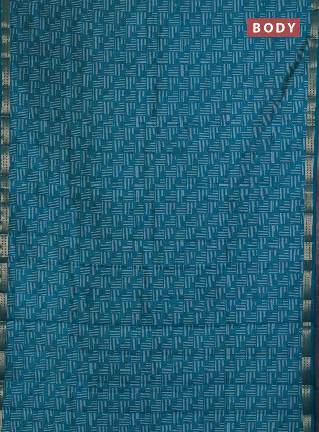 Semi Raw Silk Saree teal green with allover geometric prints and zari woven border