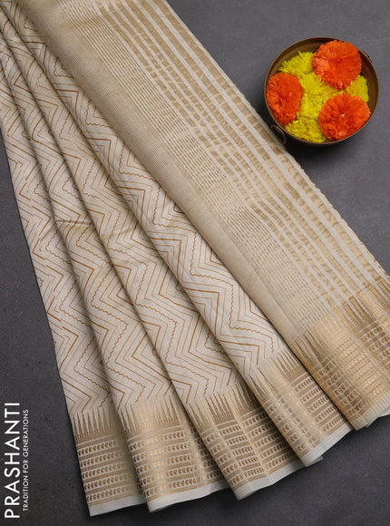 Semi Raw Silk Saree cream with allover zig zag prints and zari woven border