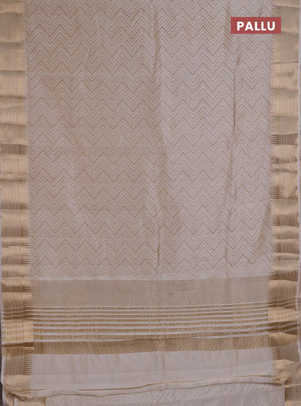 Semi Raw Silk Saree cream with allover zig zag prints and zari woven border