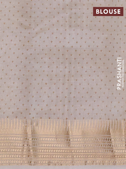 Semi Raw Silk Saree cream with allover zig zag prints and zari woven border