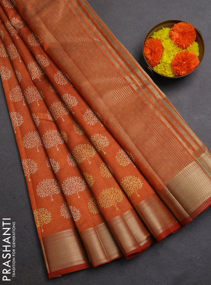 Semi Raw Silk Saree rust shade with allover butta prints and zari woven border
