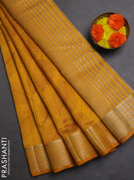Semi Raw Silk Saree dark mustard with allover leaf butta prints and zari woven border
