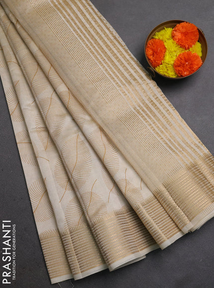 Semi Raw Silk Saree cream with allover leaf butta prints and zari woven border