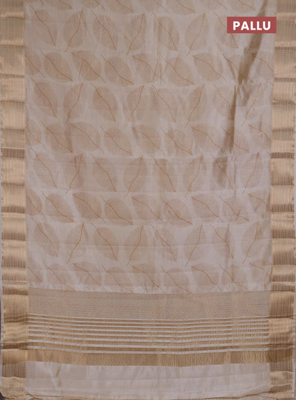 Semi Raw Silk Saree cream with allover leaf butta prints and zari woven border