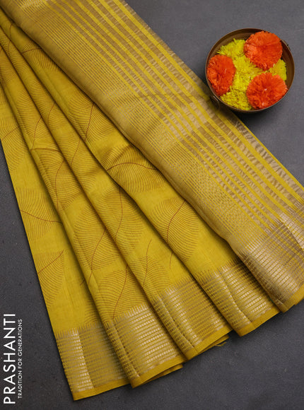 Semi Raw Silk Saree mustard yellow with allover leaf butta prints and zari woven border