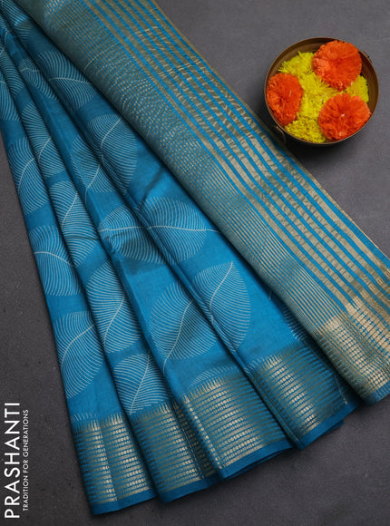 Semi Raw Silk Saree cs blue with allover leaf butta prints and zari woven border