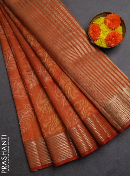 Semi Raw Silk Saree rustic orange with allover leaf butta prints and zari woven border