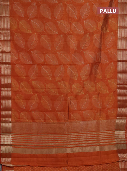 Semi Raw Silk Saree rustic orange with allover leaf butta prints and zari woven border