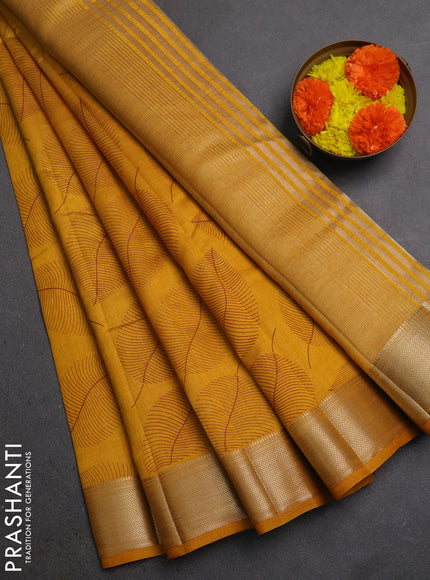 Semi Raw Silk Saree dark mustard with allover leaf butta prints and zari woven border