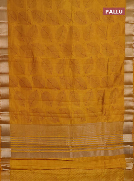 Semi Raw Silk Saree dark mustard with allover leaf butta prints and zari woven border