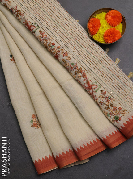 Linen Cotton Saree cream and rust shade with embroidery buttas and embroidery pallu