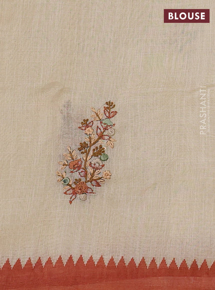 Linen Cotton Saree cream and rust shade with embroidery buttas and embroidery pallu